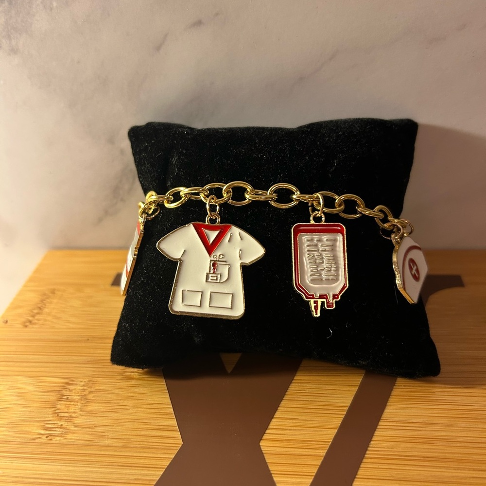Gold Charm Bracelet with Medical Themed Charms